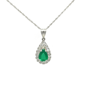 14kt white gold emerald pear shape and diamond halo pendant. The center emerald weighs 1.00tw.