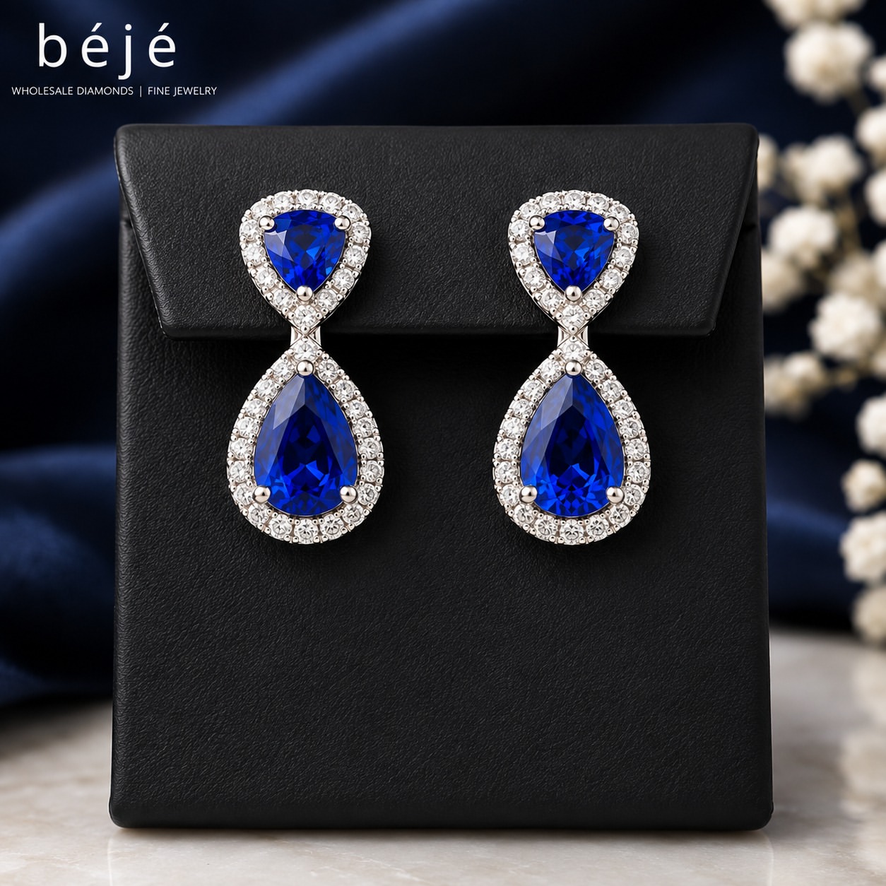 Discover Our Sapphire and Diamond Halo Drop Earrings - jewelry store in metairie - beje jewelry